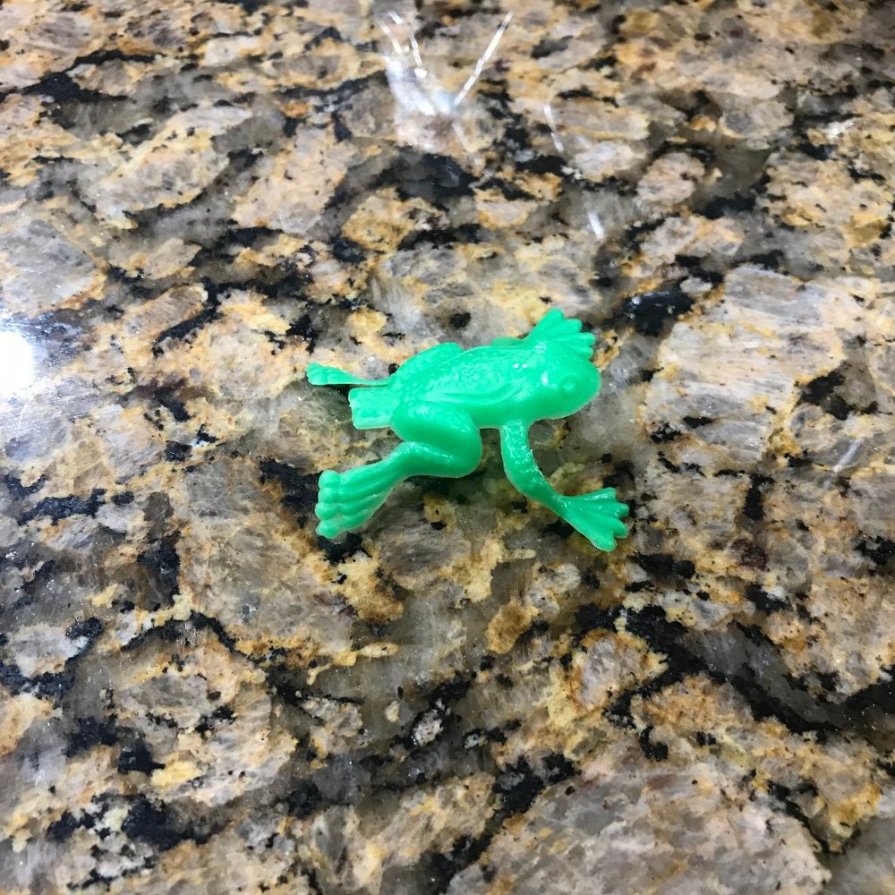 REALLY FAR JUMPING FROG TOY